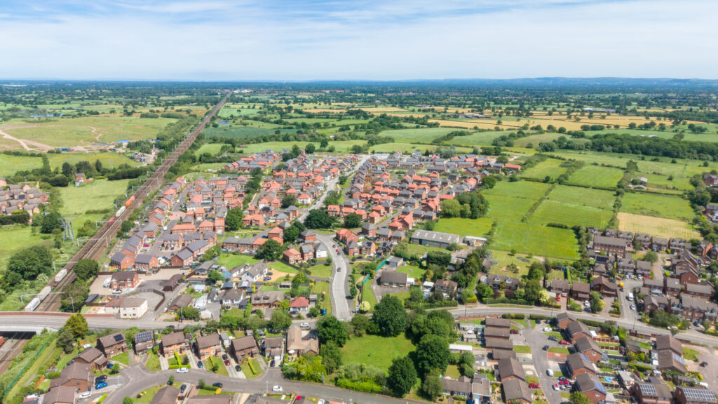 Housing targets and housing delivery. Aerial View of Muller Property Groups Crewe Housing Development